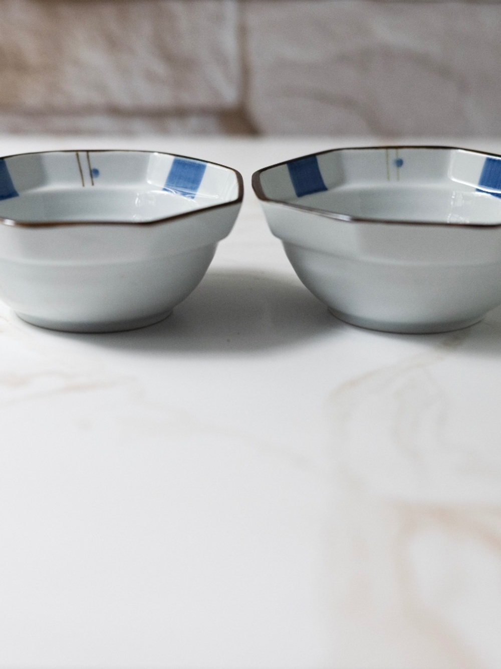 Pair of vintage Japanese octagonal blue white brown small bowls